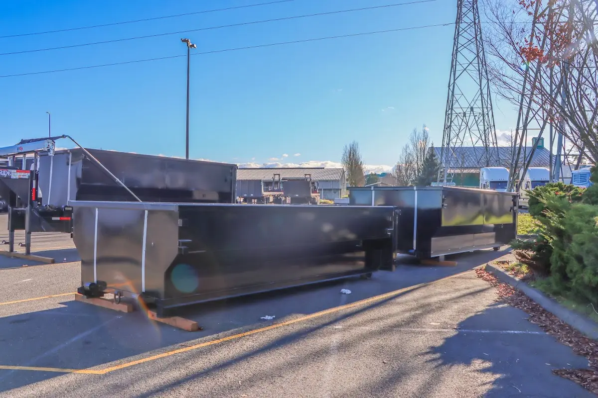 Roll-off dumpster ready for waste disposal at job site for 15 Yard Dumpster Rental in Oxford